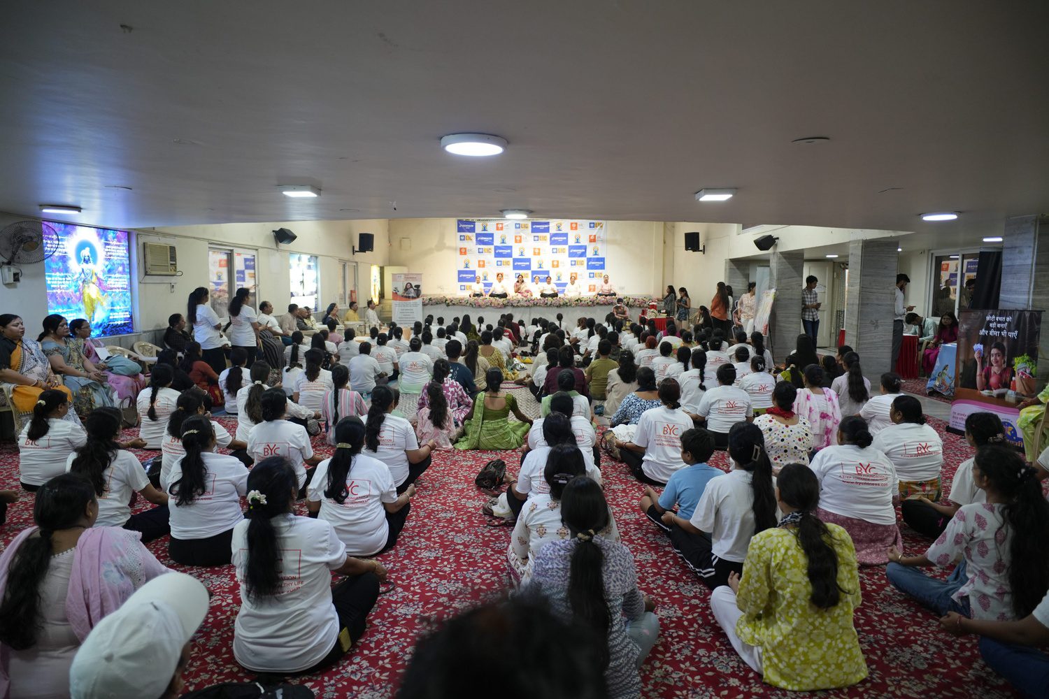 Participants practicing yoga postures